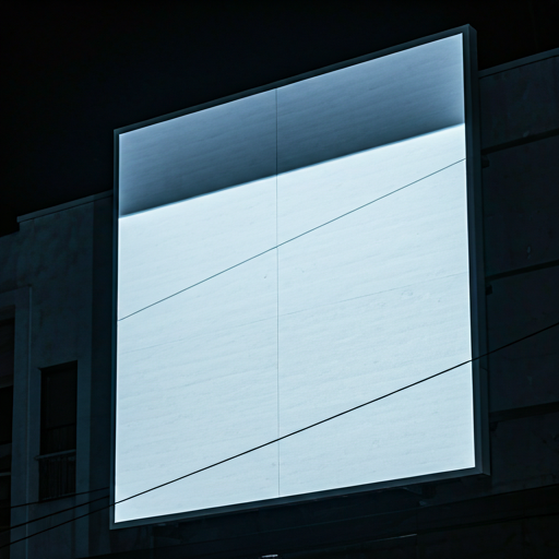 A large retail store sign at night